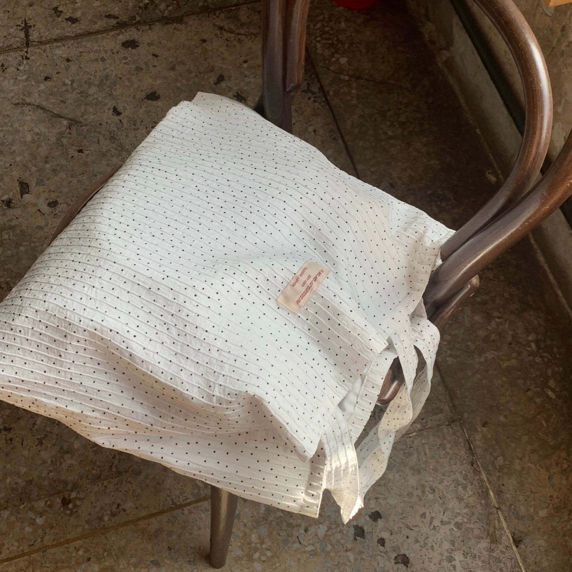 {{ product.title }} - {{ shop.name }}