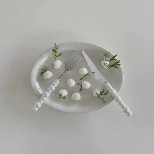 {{ product.title }} - {{ shop.name }}